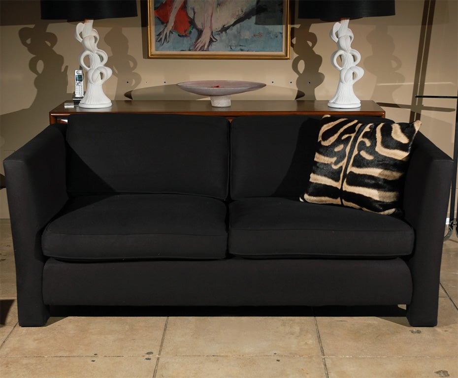Hand tied springs, down wrapped, upholstered in black cashmere