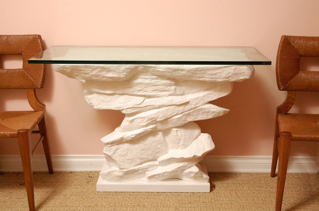 A favourite of French Interior Designers, we bought the original at a Hollywood prop house auction. Created by legendary Parisian Designer Emilio Terry, we hand cast the console in resin that simulates plaster. Wood base. Available with or without