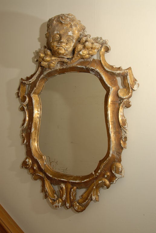 Carved gilt mirror