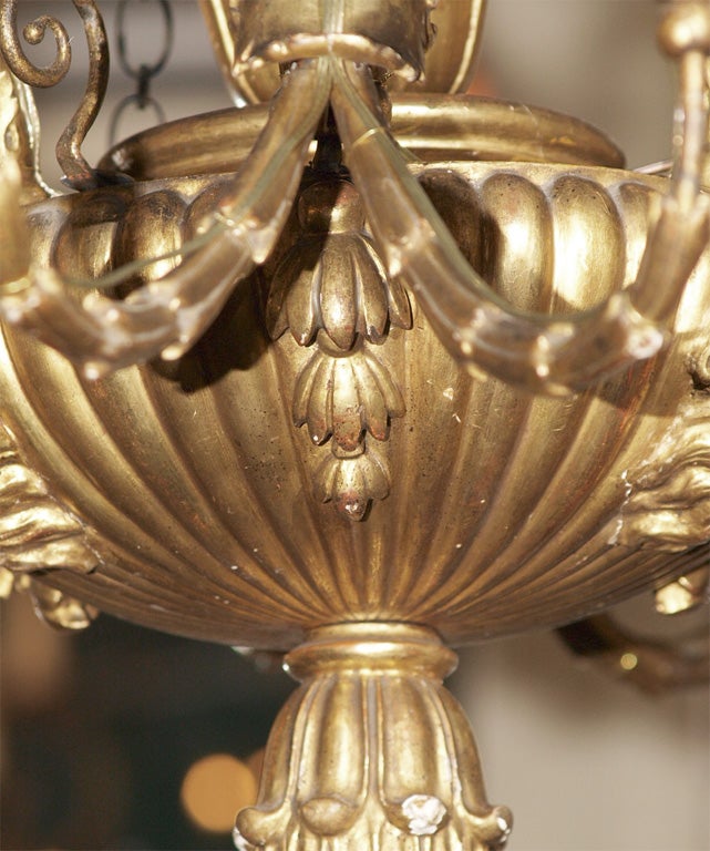 Antique Italian carved giltwood twelve light chandelier. 3