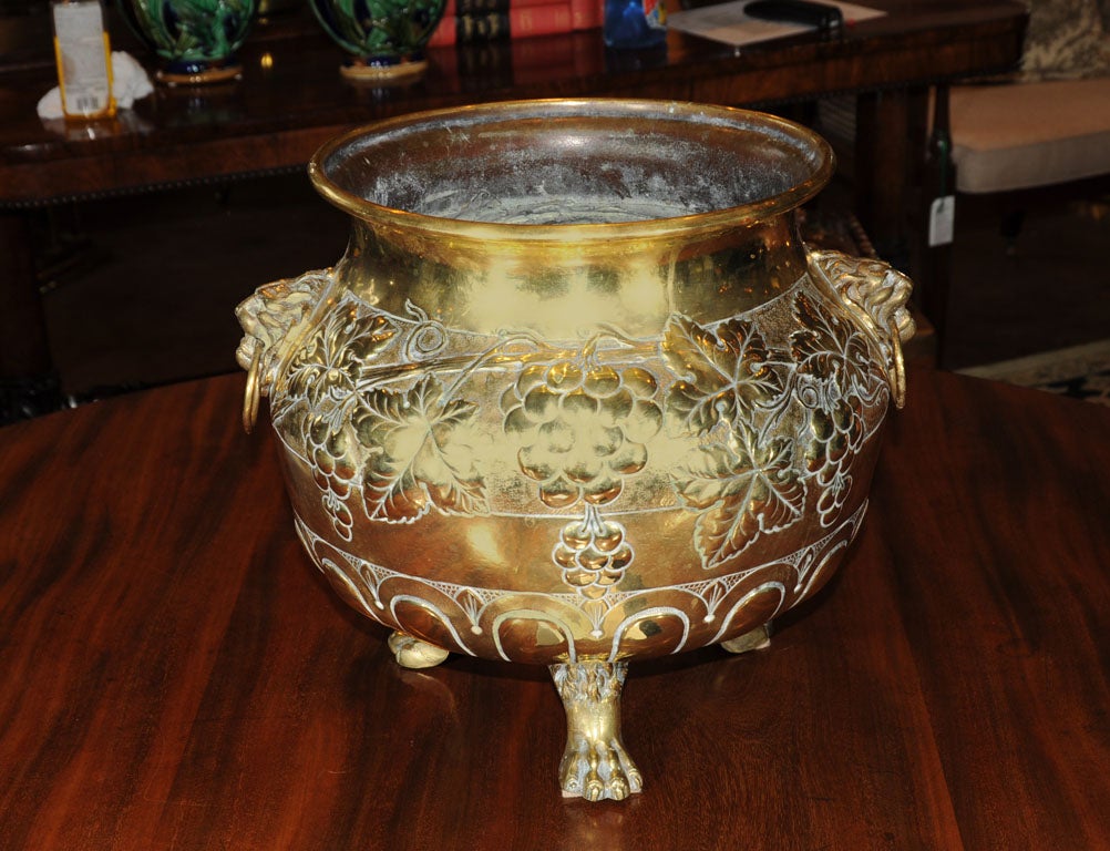 Footed Jardiniere of Brass with Relief of Grapes and Leaves