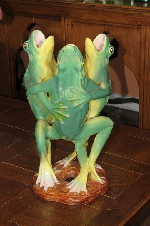 dancing frogs statue
