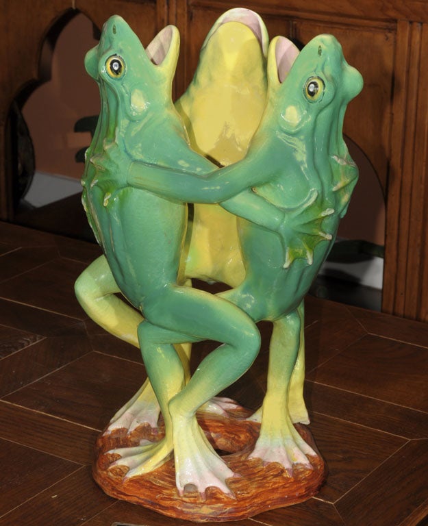 Art Pottery Majolica from Art Nouveau-era France by the celebrated Golfe Juan firm, Clement Massier.<br />
A joyfully-designed centerpiece featuring a group of three standing frogs in an embrace and dancing in a circle. <br />
Crafted and