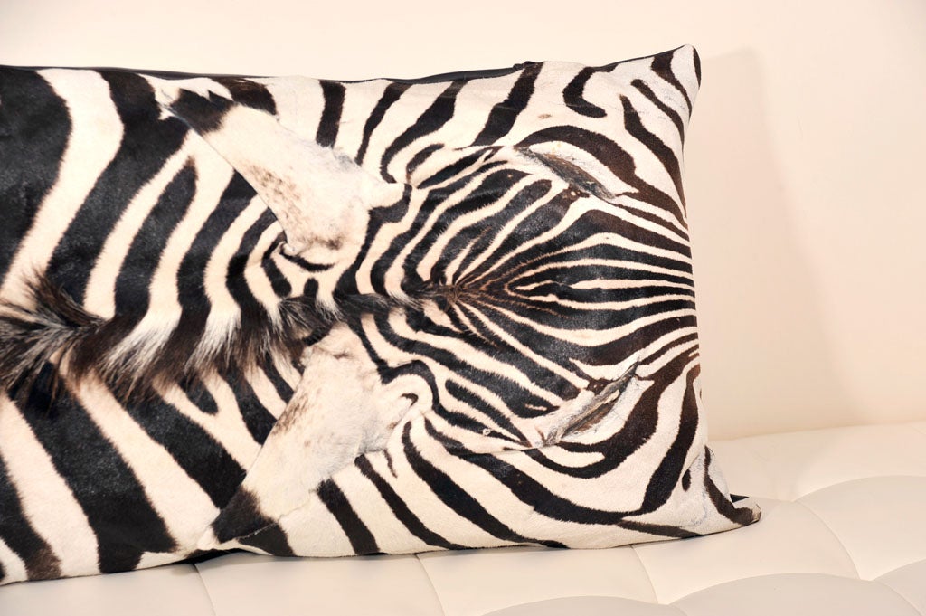 Beautiful zebra pillows. 
Backed with beautiful brown Italian lambskin leather.

Price is $450 for 16 inches x 16 inches. We no longer have the longer, larger size zebra pillow.