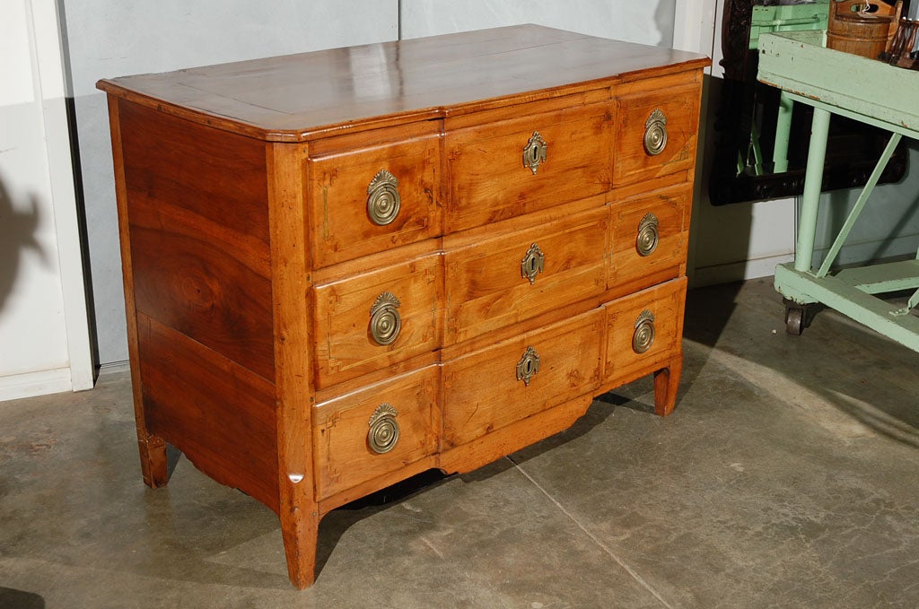 An excellent Italian commode, circa 1760, having three full length drawers and raised on four small tapering legs. With its great design and rich brown coloring this period piece will command attention when placed in your next setting. There are