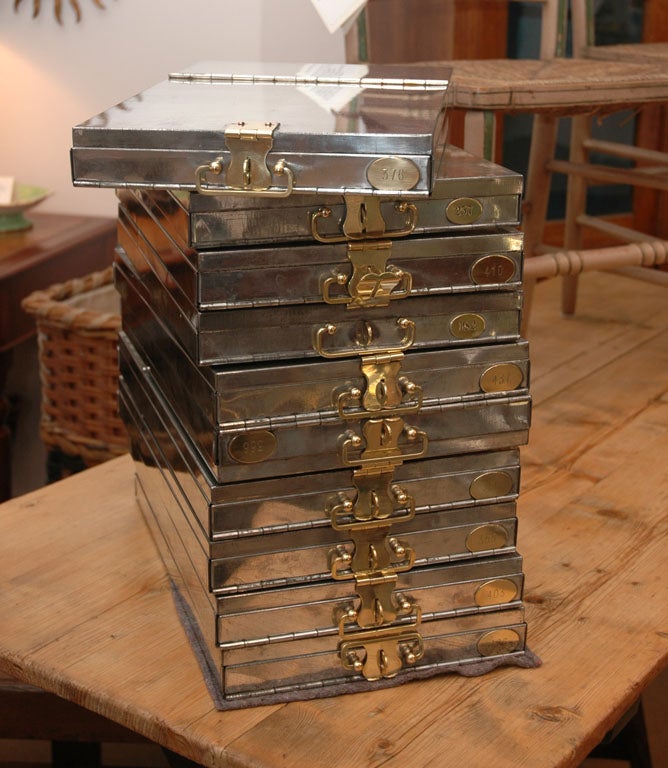 Safety deposit boxes from a bank in Zurich, boxes are chrome-plated with brass handles and number plaques - all have been highly polished.  Seven are available.  Price is for each one.