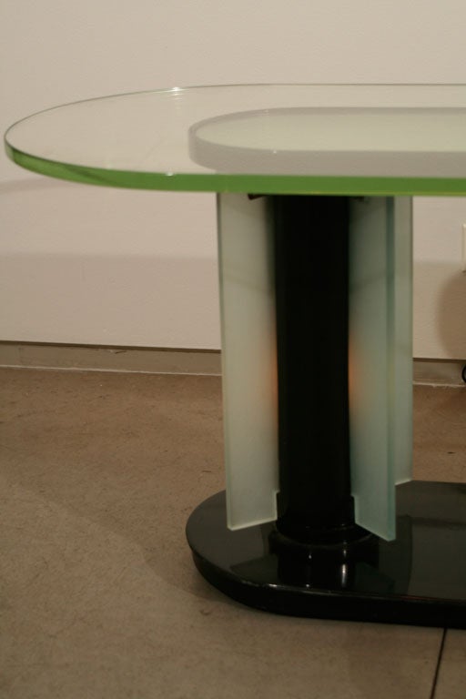 There are lights between the frosted glass and laminate legs thus creating a subtle glow when the lights are turned on.
