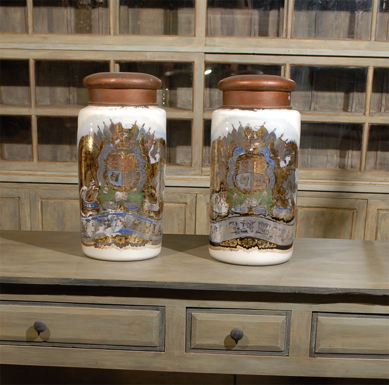 Very Large Pair of British Painted and Gilded Apothecary Jars with Original Lids. 

2 inscriptions on each jar: 
