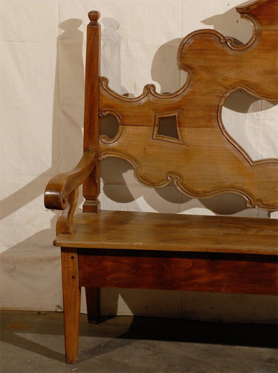 A Richly Carved Brazilian Wooden Bench In Good Condition In Atlanta, GA