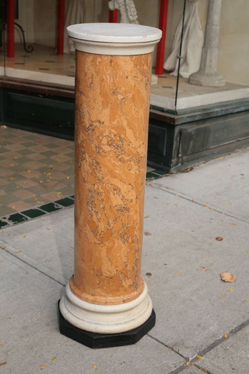 A fine example of an Italian antique process. The production of scagliola used since Roman times is a method of duplicating marble using natural crushed stone, plaster , bitumen and other materials baked hard and polished out. This pedestal in