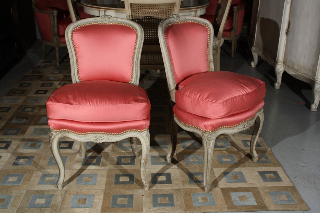 Pair of newly upholstered Jansen-stamped chairs.
