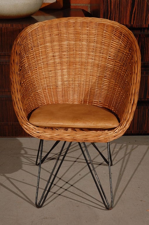 Rohe Noorwolde rattan hair with hair pin legs and leather cushion
