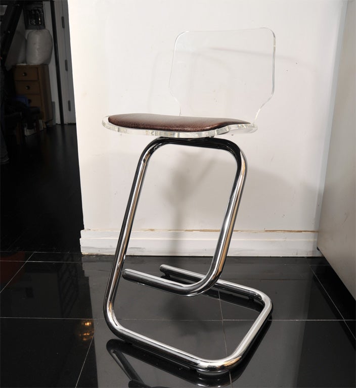Great set of four Lucite bar stools.
Some modern pieces will never go out of style.
They are strong and comfortable and have a nice bounce to them.