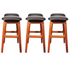 3 Danish bar stools in teak, leather and brass footrails