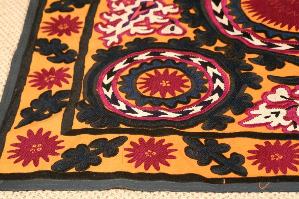 A Mid 20th Century Embroidered Suzani with Circular Designs