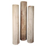 A collection of of 3, 19th-century fluted Doric columns