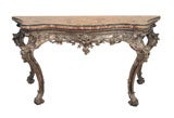 A Highly Carved Rococo Silver Gilt Console