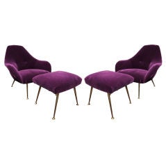 PAIR OF PURPLE LOUNGE CHAIRS WITH OTTOMANS BY "STEINER"