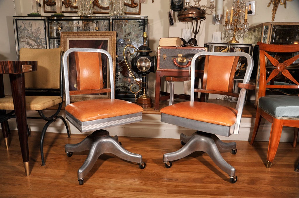 A Set of Navy Armchairs and Side Chairs