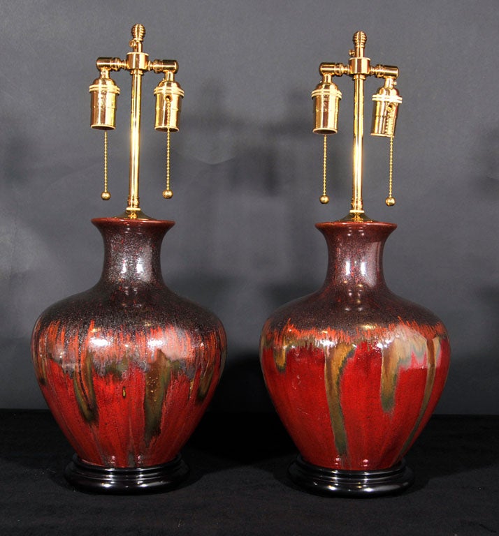 Pair of hand thrown pottery vases as lamps with overlay glaze