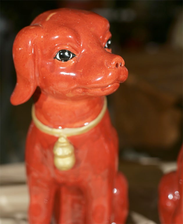 20th Century Pair Of Red Glazed Porcelain  Dogs For Sale
