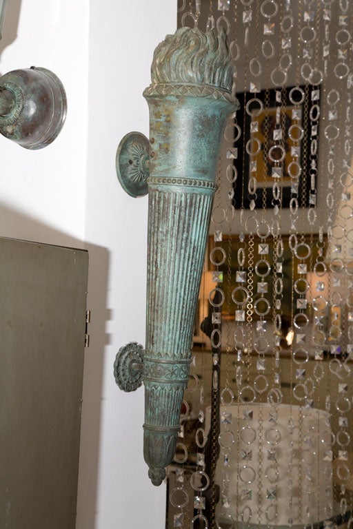 Mid-20th Century Pair of Cast Bronze Torch Sconces from Warner Estate