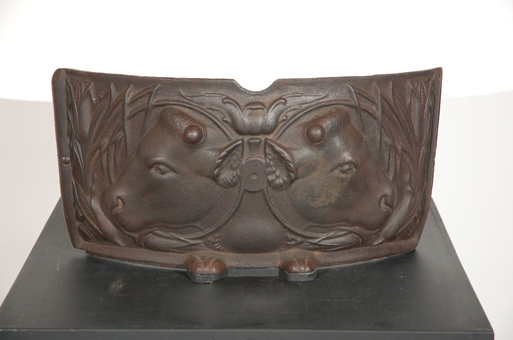 Great cast iron industrial relief of a bull or steer in a corn field.