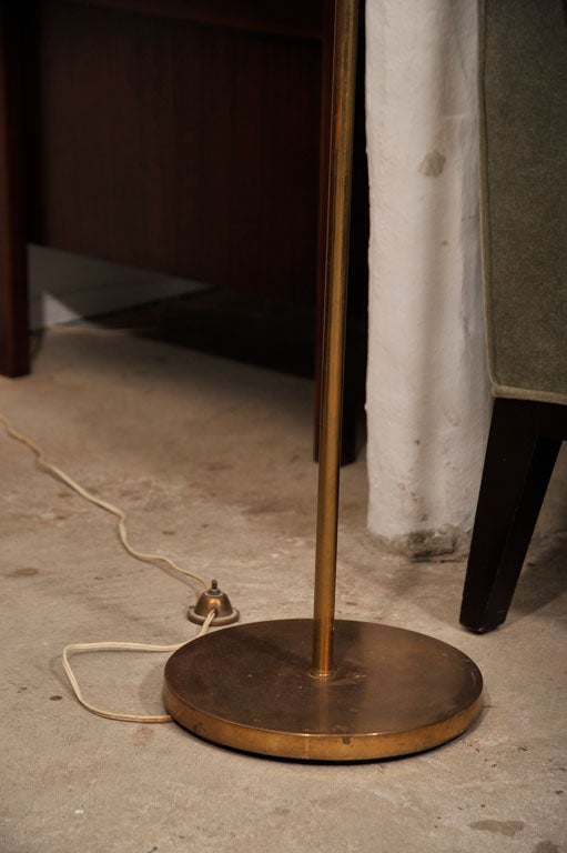 3 arm, articulated, 1950's brass floor lamp, mfg by Lightolier. Illustrated in Cara Greenberg's MID-CENTURY MODERN book on page 126.