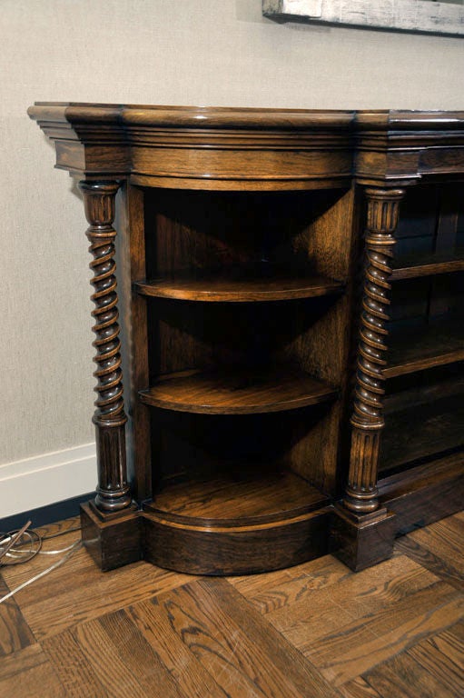 Fine Scottish Rosewood Bookcase with Well-Carved Barley Twist Supports and Adjustable, Pegged Shelves.  Central Horizontal Section Flanked by Rounded Ends.  Scotland, c. 1850<br />
<br />
91.5 inches wide x 19.5 inches deep x 38 inches high