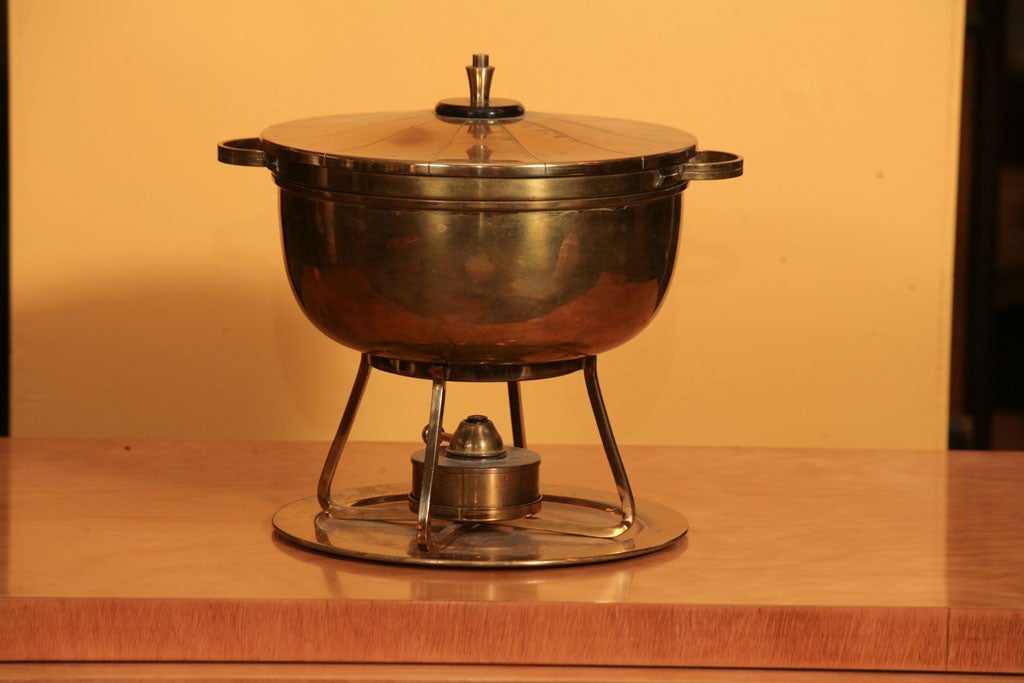 Stylish double boiler of solid brass, with tin lining, designed by Tommi Parzinger for Dorling Silversmiths.  Double boil leaves room for water in a separate internal chamber, to keep food evenly warm.