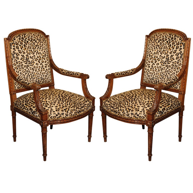 Pair Louis XVI Style Carved Fauteuils with Faux Upholstery