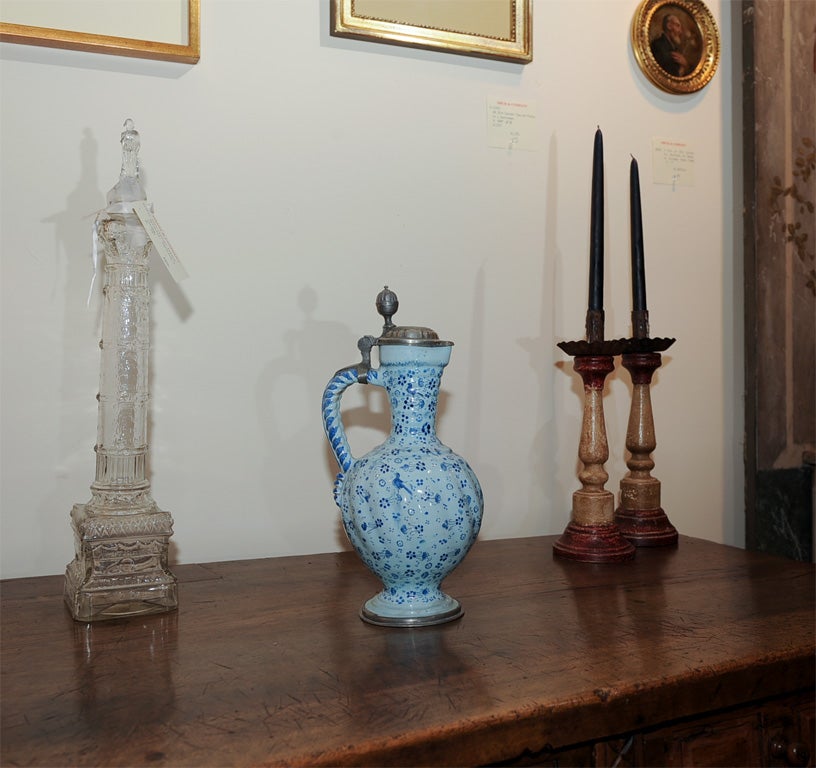 An 18th century blue on blue German faience Ewer with both a decorated pewter lid and base