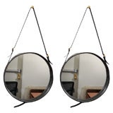Pair of large Jacques Adnet mirrors