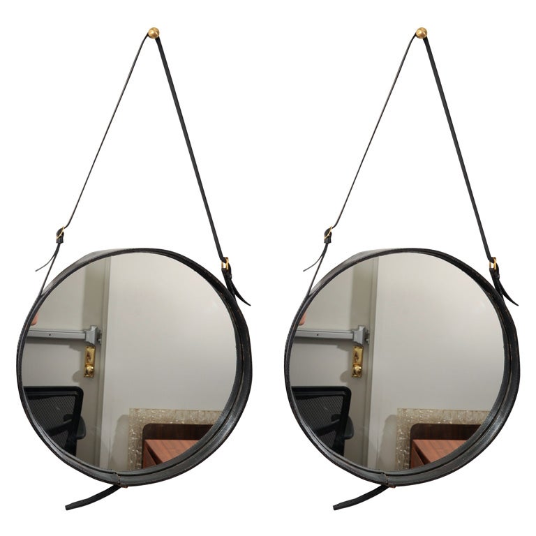 Pair of large Jacques Adnet mirrors