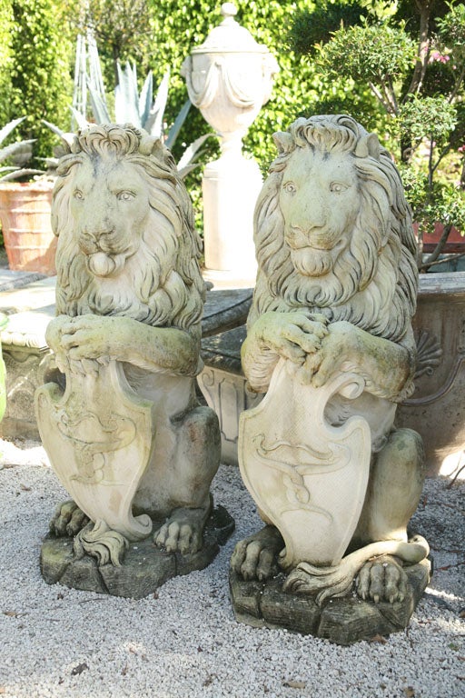 Italian A Pair of Sitting Lions For Sale