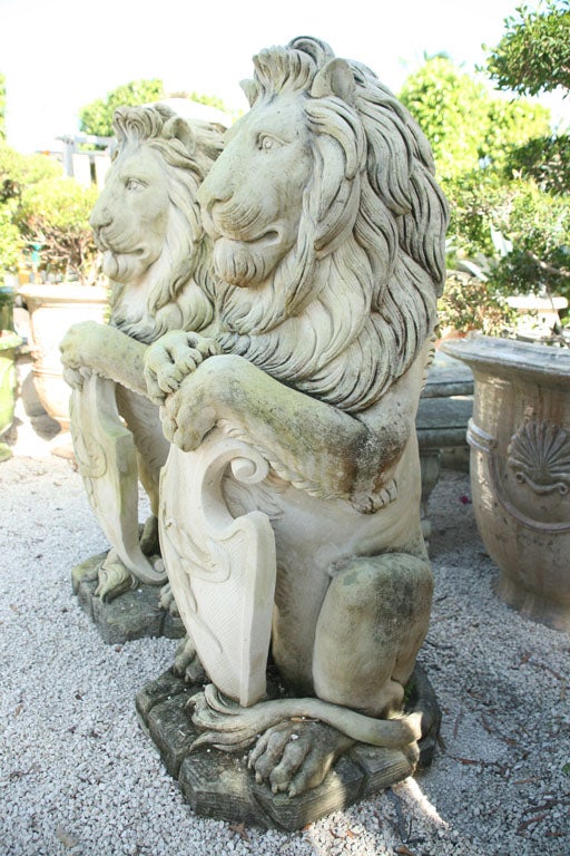 A Pair of Sitting Lions For Sale 3