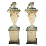 A Pair of lidded " Della Robbia " Urns