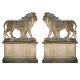 A Pair of Monumental Carved Limestone Lions