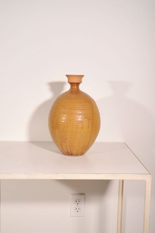 Tall vase with flaring rim and drip glaze by San Diego policeman turned potter Wayne Chapman. A large and impressive example of Chapman's work.