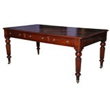 An English 19th century 6 drawer writing table.