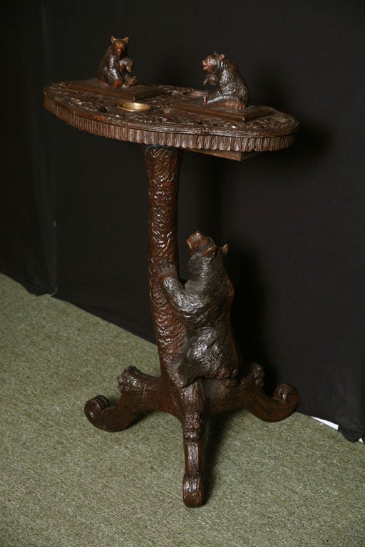 A 19th century Swiss Carved / Black Forest table