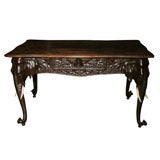 Antique A 19th century Swiss Carved table with Elephant carvings
