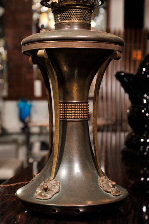 Exceptional tall Art Nouveau electrified oil table lamp, this turn of the century lantern is one of a kind.
