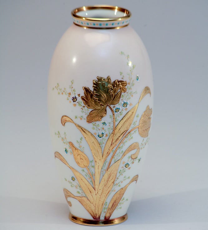 This jewel of a vase is a masterful example of Ceramic Art Company-Lenox, in the Art Nouveau style. Completely hand decorated with two colors of raised paste gold depicting tulips are on both sides of the piece. The neck is decorated with turquoise