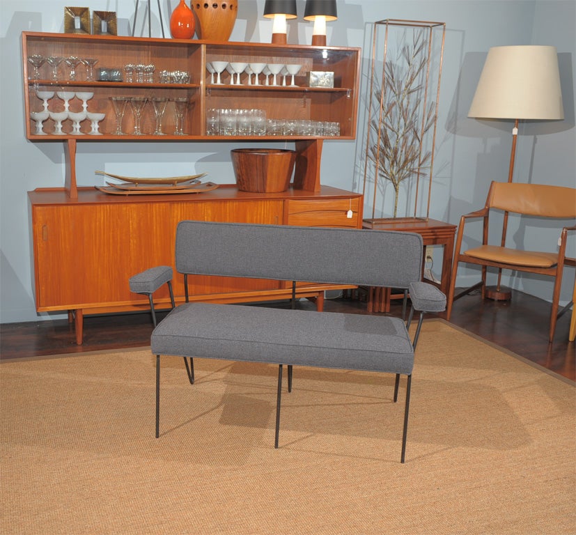 Rare Dorothy Schindele California modern design settee newly upholstered in Maharam wool.