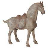A  FIGURE OF A SADDLED HORSE. TANG DYNASTY (618-907)