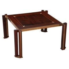 A Fine Ebony de Maccasar, Rosewood, Ivory, and Brass Low Table
