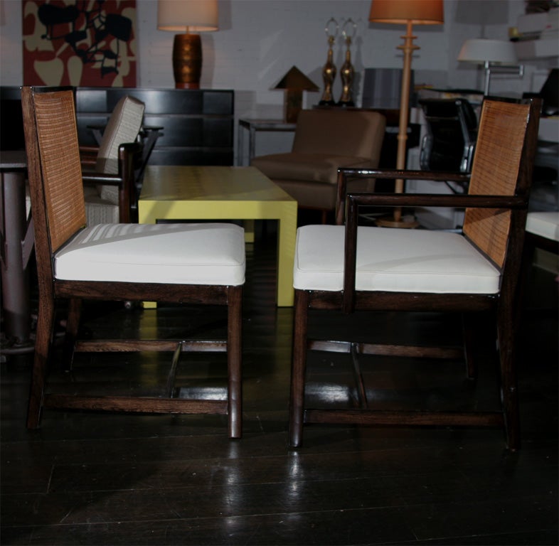 Set of lacquered wood dining chairs with cane backs