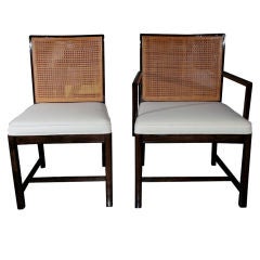 Set of lacquered wood dining chairs with cane backs