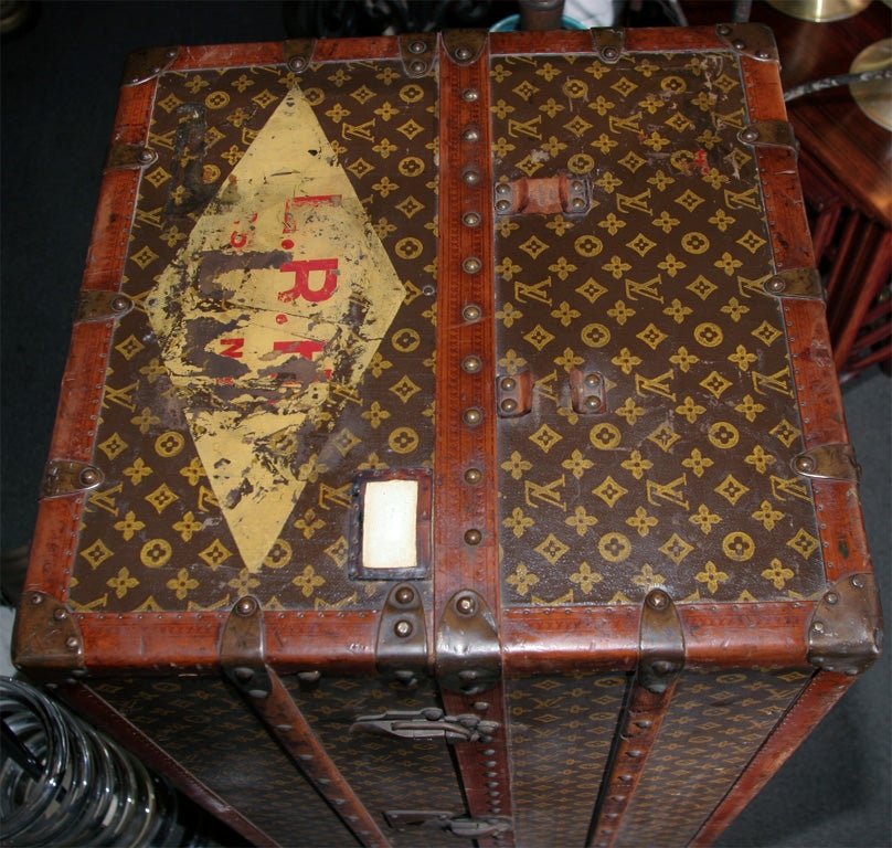 Vintage Louis Vuitton steamer trunk with six drawers, hangers and shoe box.